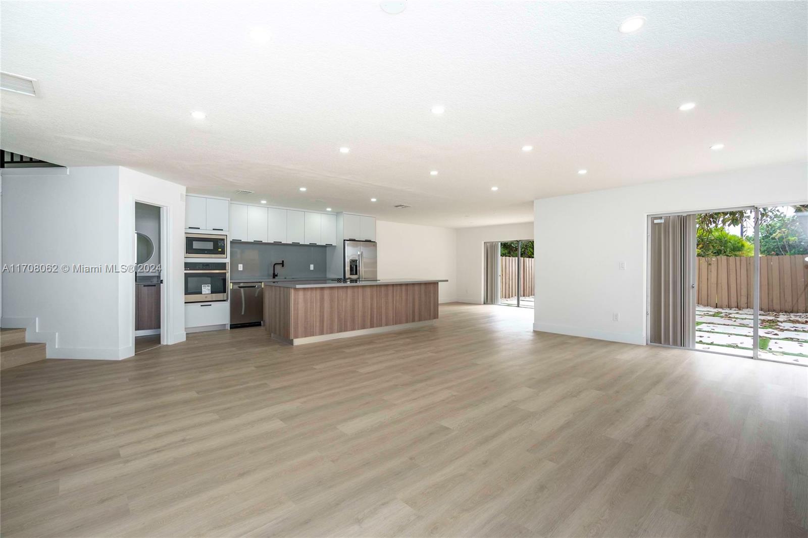 a view of kitchen with wooden floor