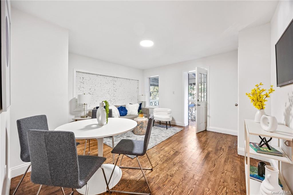 Dining area featuring hardwood / wood-style flooring