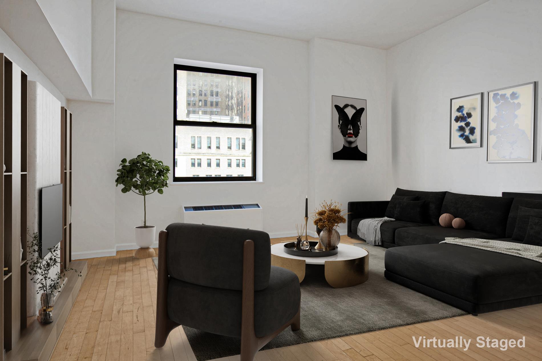 a living room with furniture rug and wooden floor