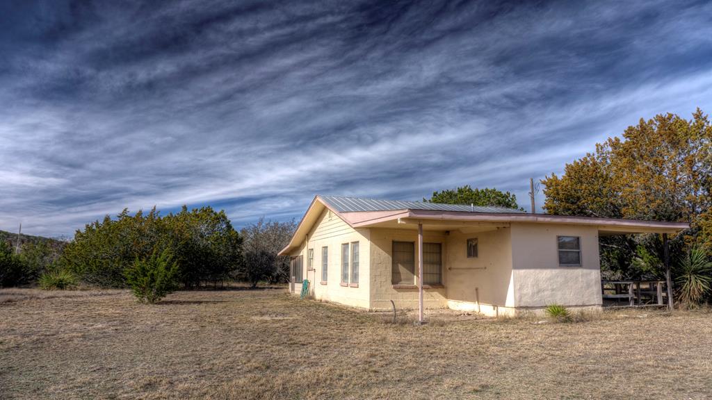 front view of a house with a patio