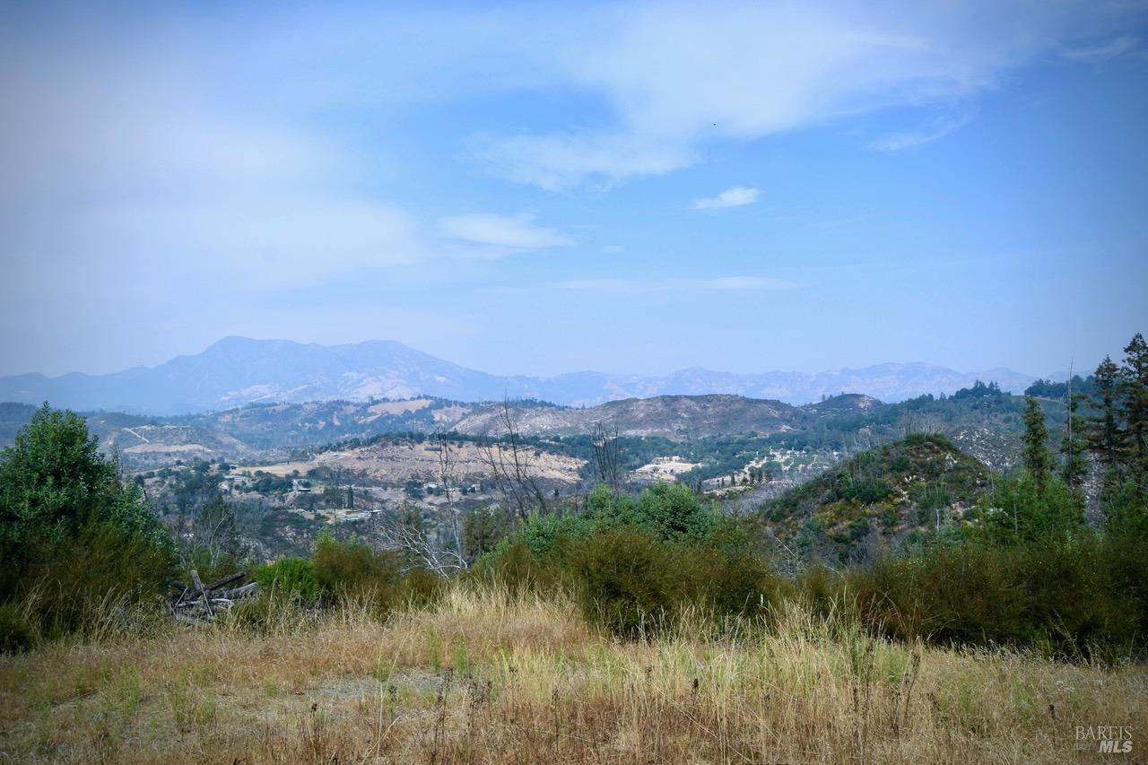 a view of city and mountains