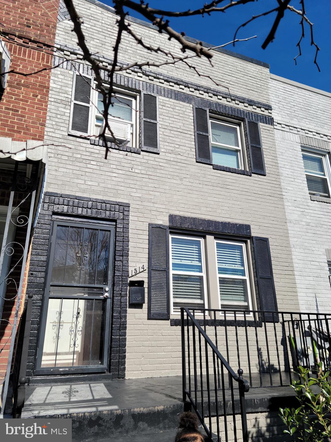 a front view of a house with a door