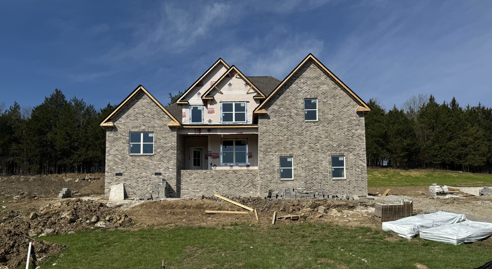 a view of house with yard