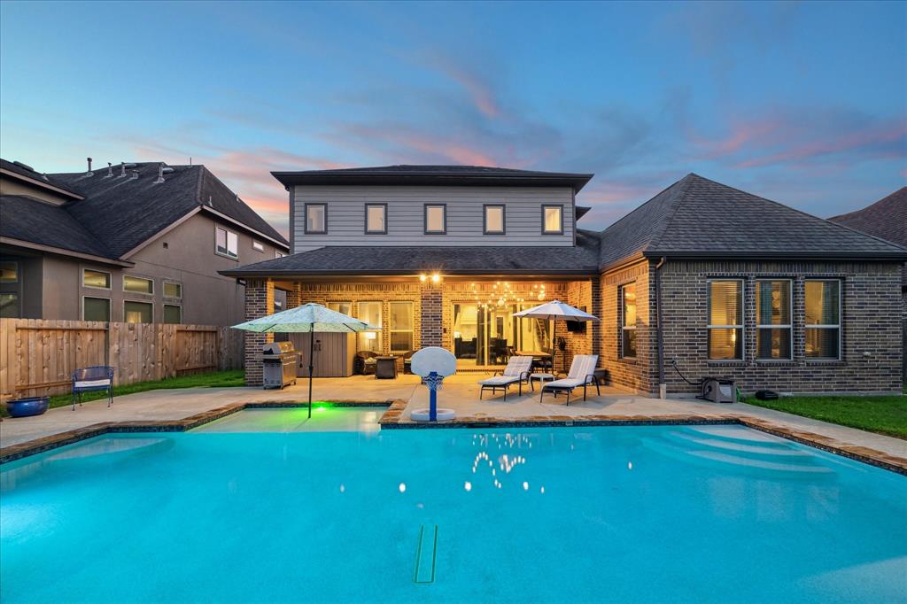 This impressive home includes a three-car garage, four bedrooms and three and half bathrooms (3 bedrooms + 2 1/2 bathrooms downstairs), open living/dining/kitchen, a private study, a massive game room, and a media room. This private oasis is beautiful by day or night.