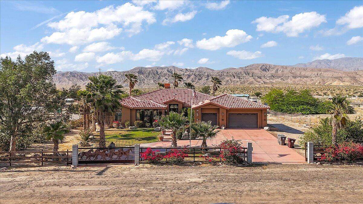 front view of a house with a big yard