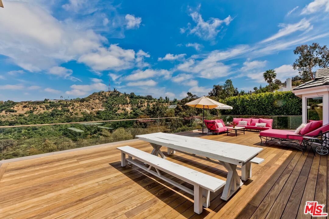 a view of a terrace with sitting area