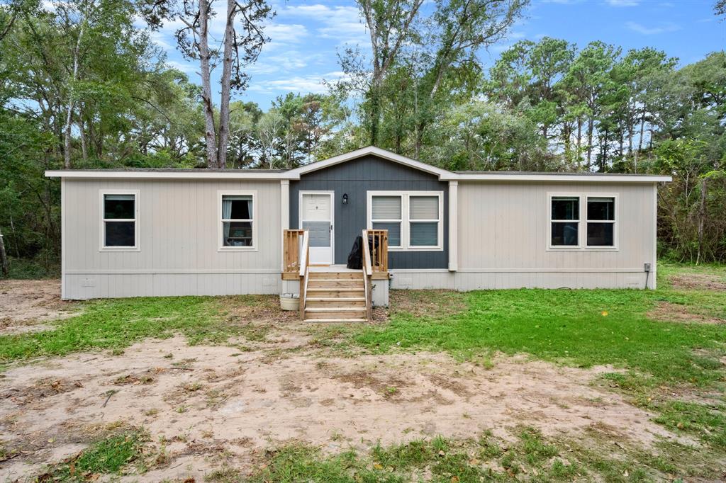 Almost new manufactured home on almost 2 acre in the country