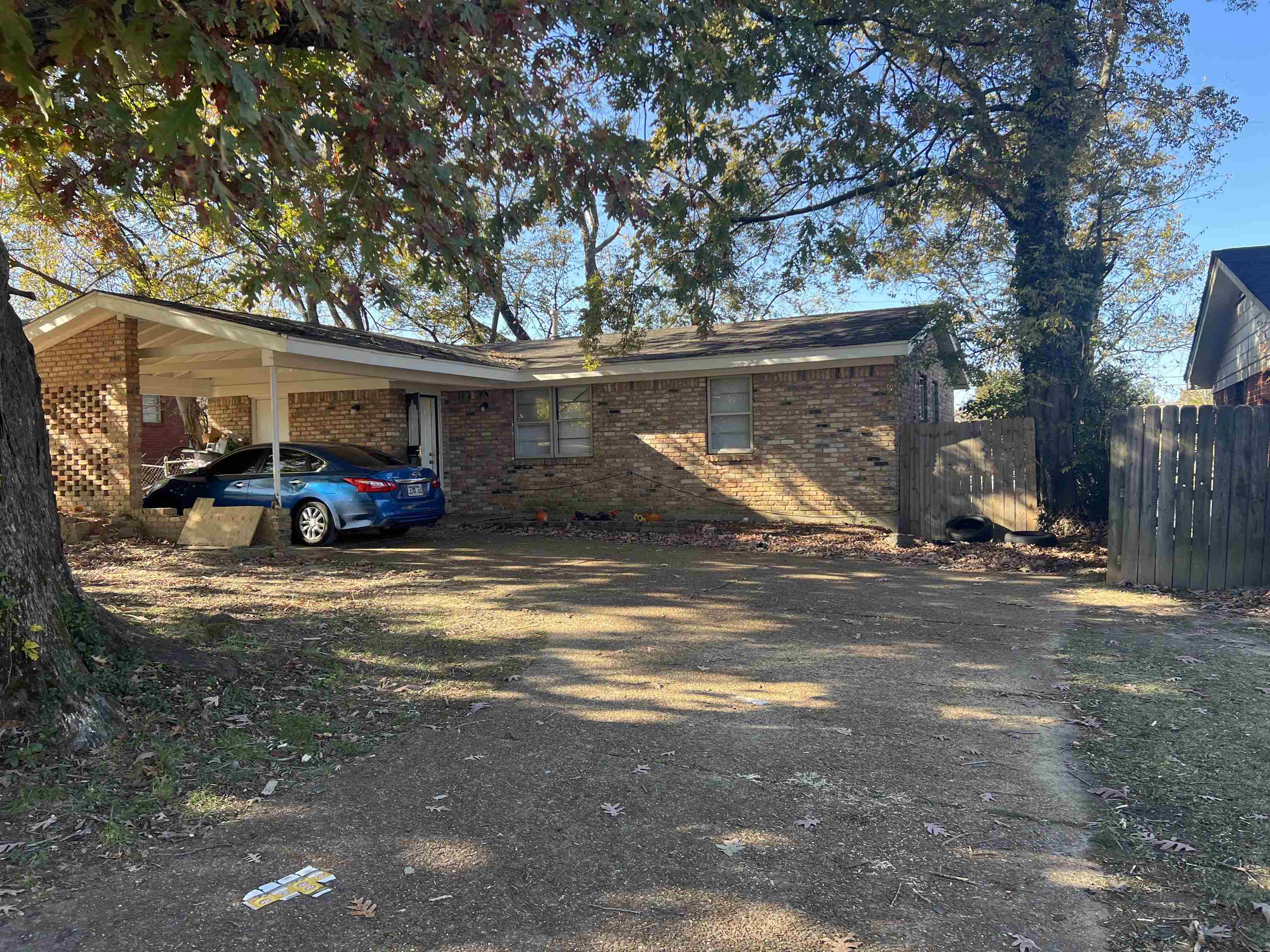 Exterior space with a carport