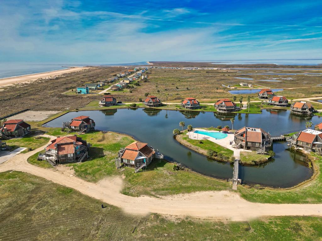 an aerial view of a house with outdoor space