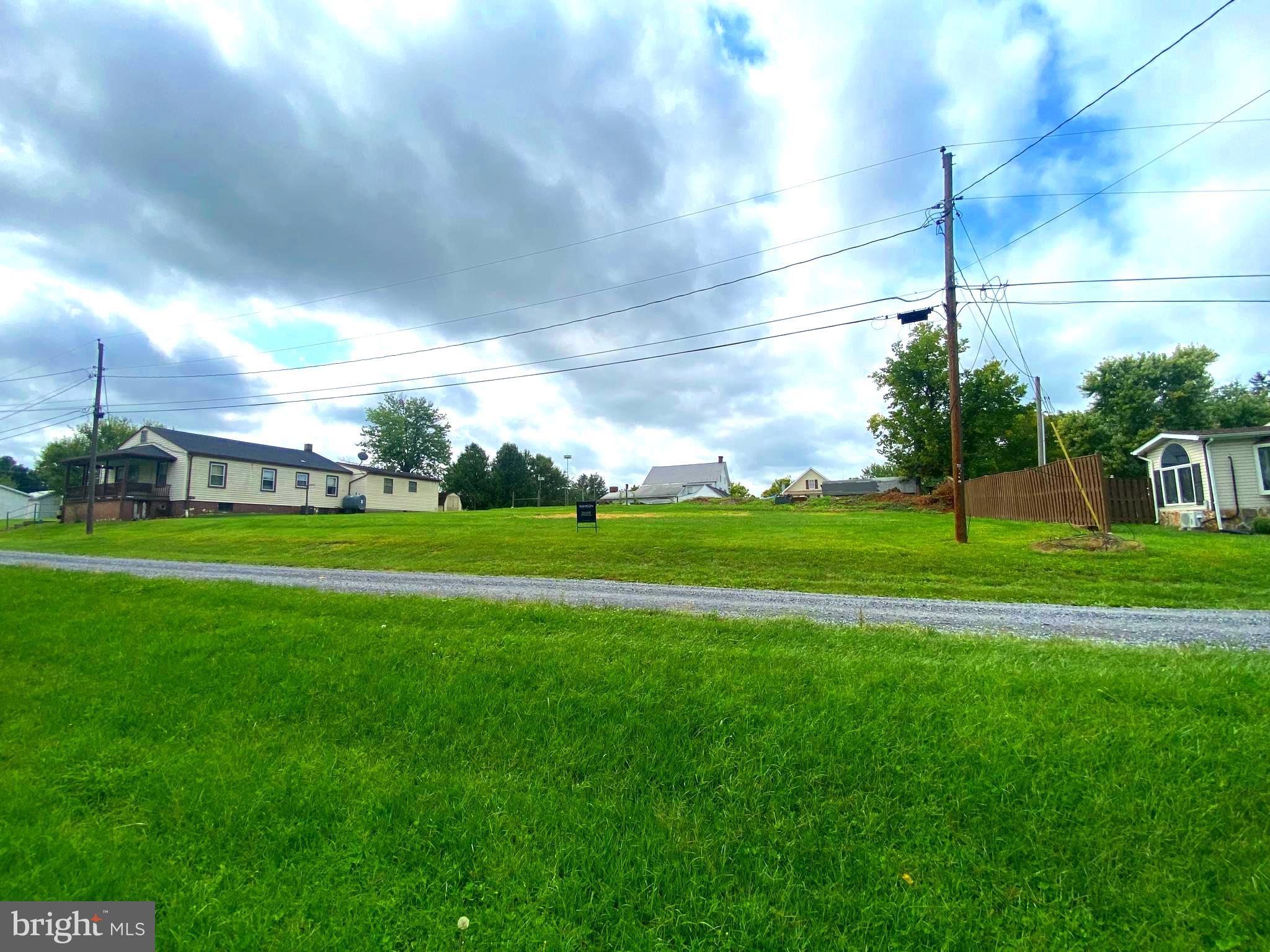 a view of a house with a big yard