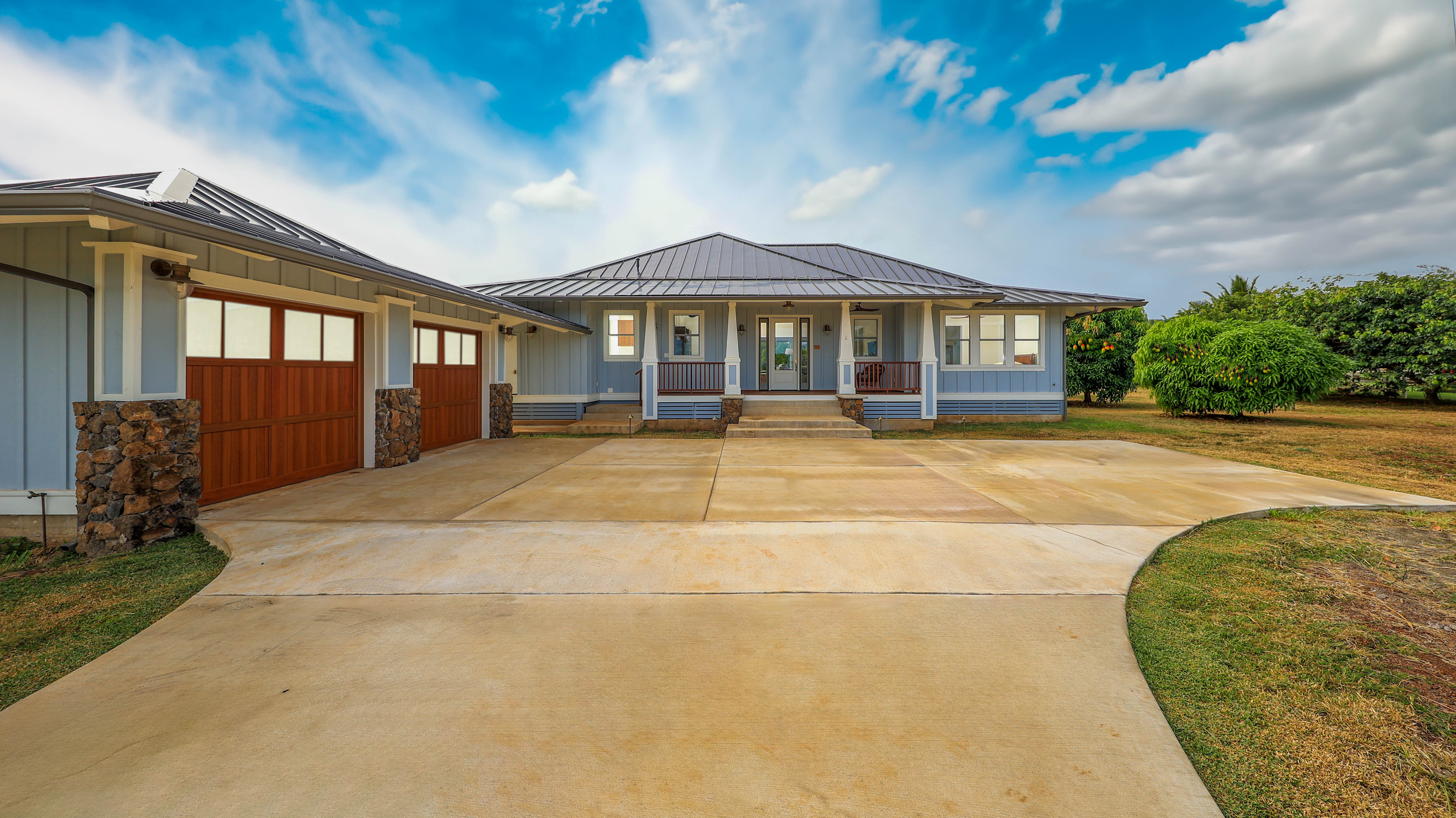 a front view of a house with yard