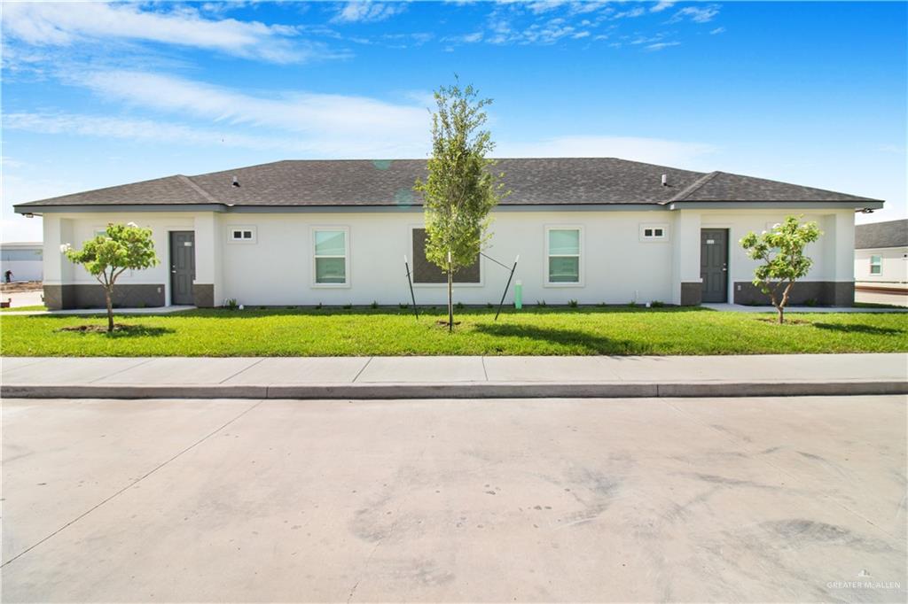 View of front of house with a front yard