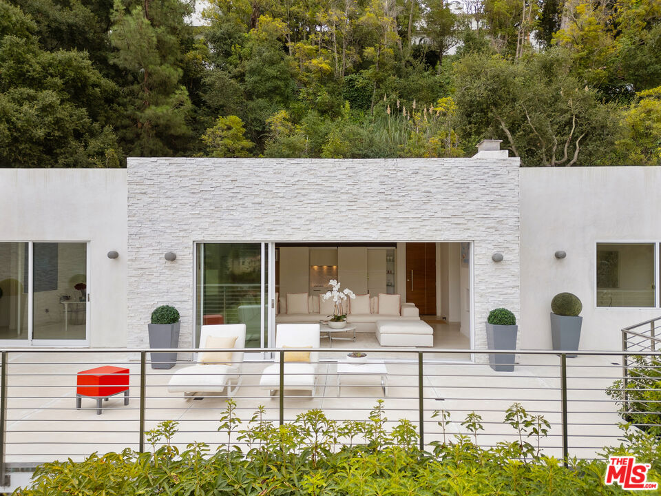 a front view of a house with patio