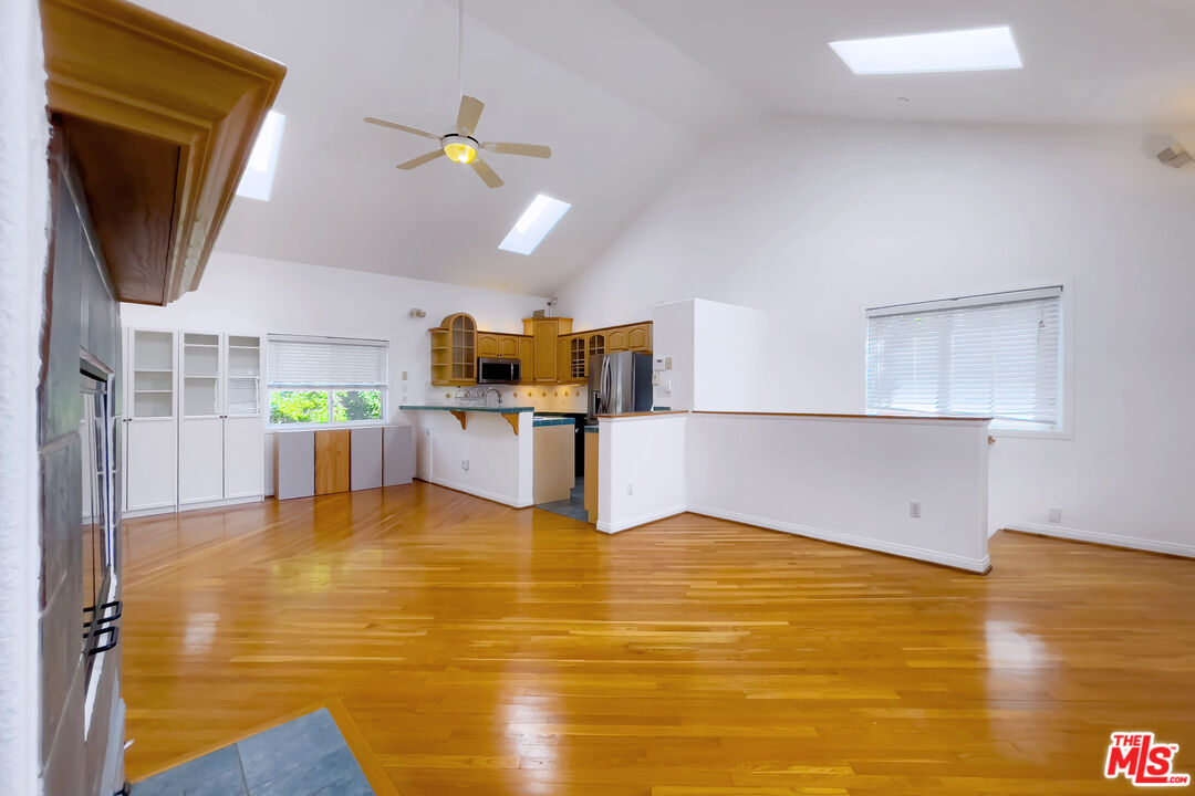 a view of kitchen with wooden floor