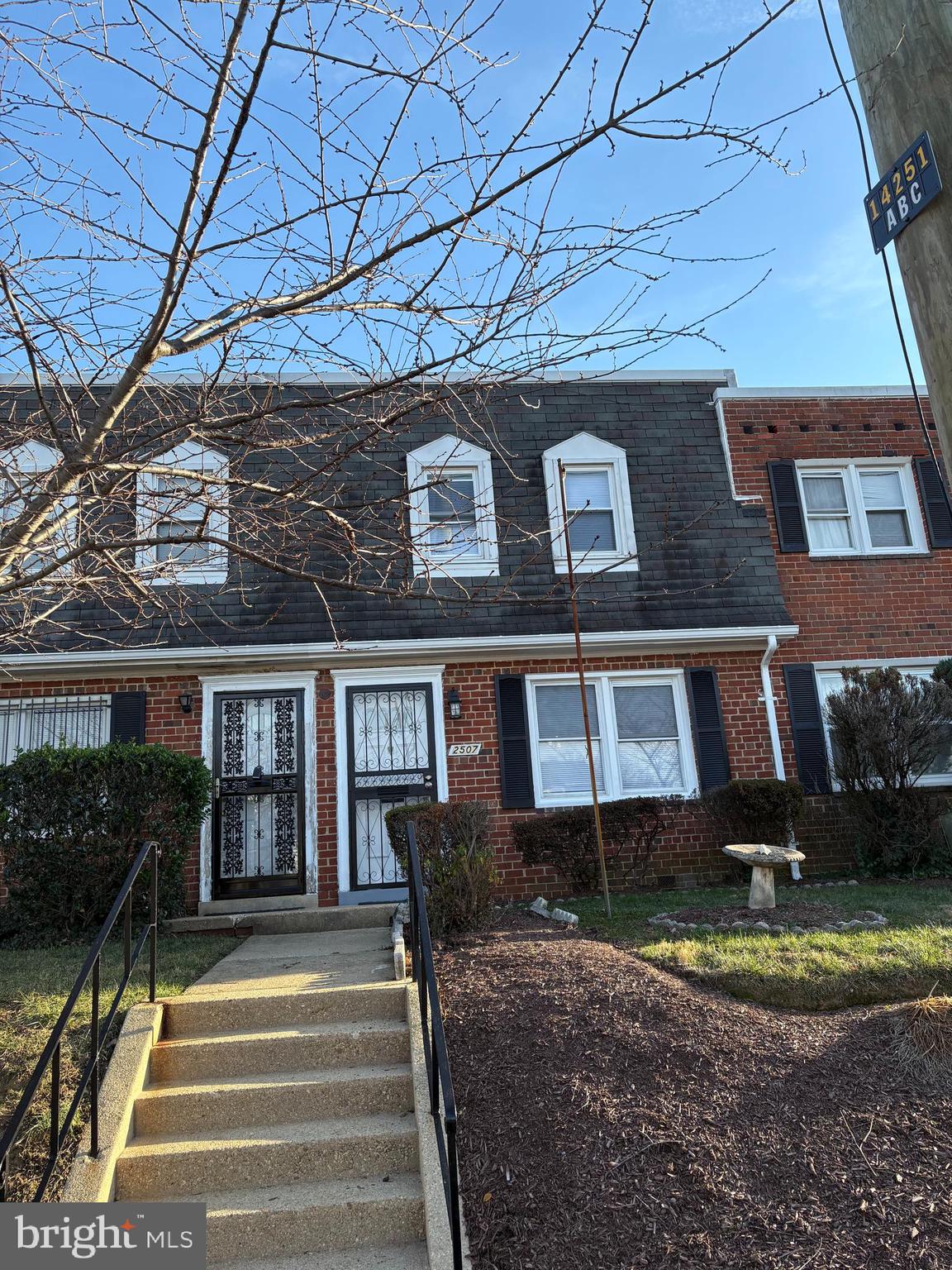 a view of a building with a porch