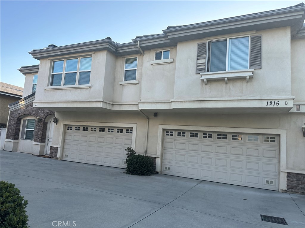 a view of a house with a garage