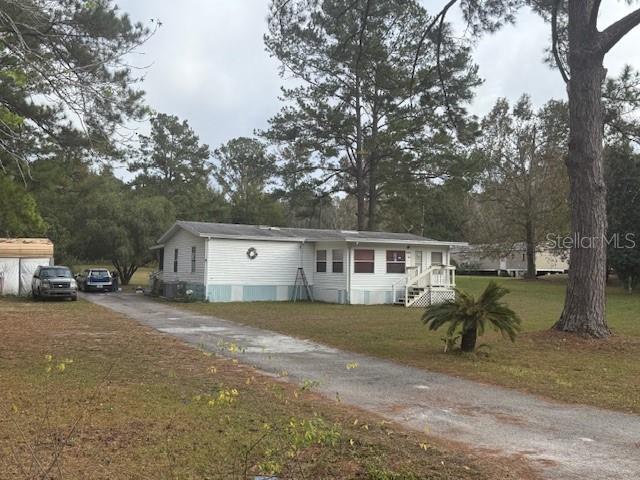 a view of a house with a patio