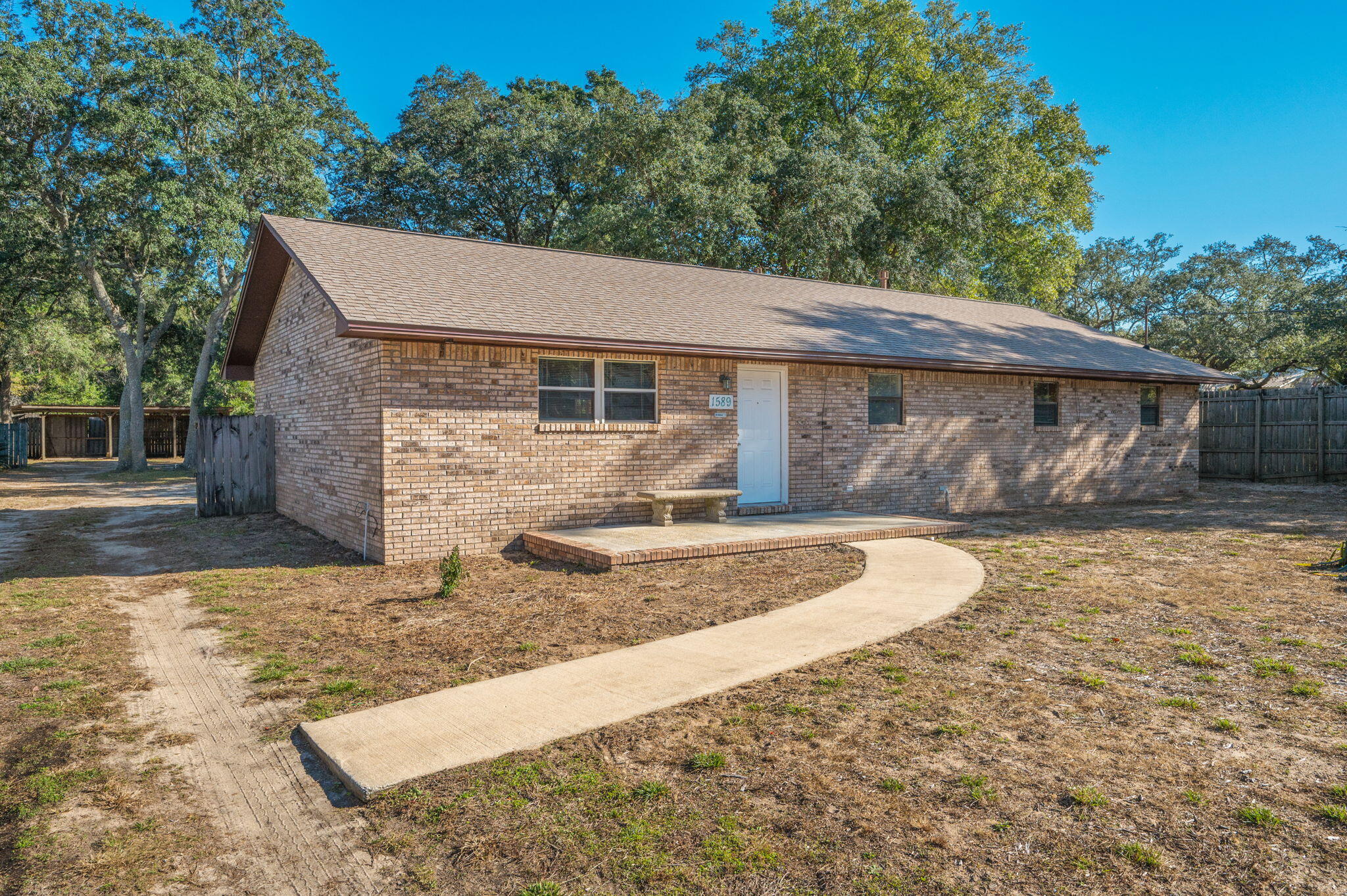 front view of a house with a yard