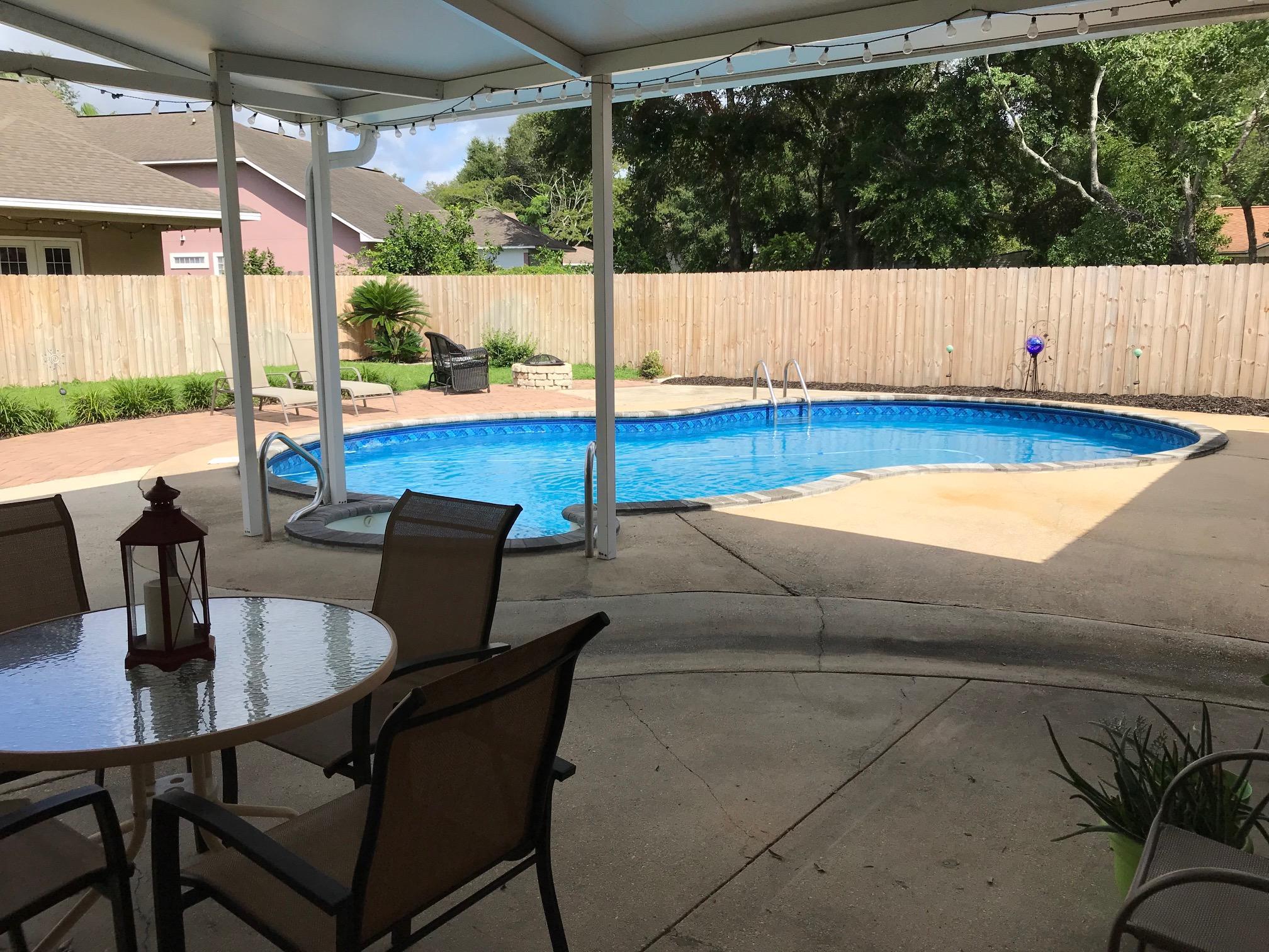 a view of outdoor space yard swimming pool and patio