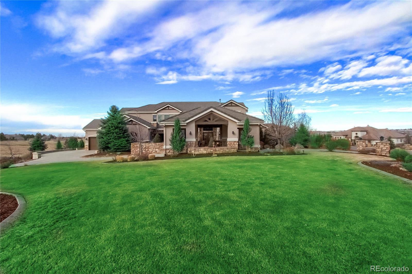 a view of a house with a big yard