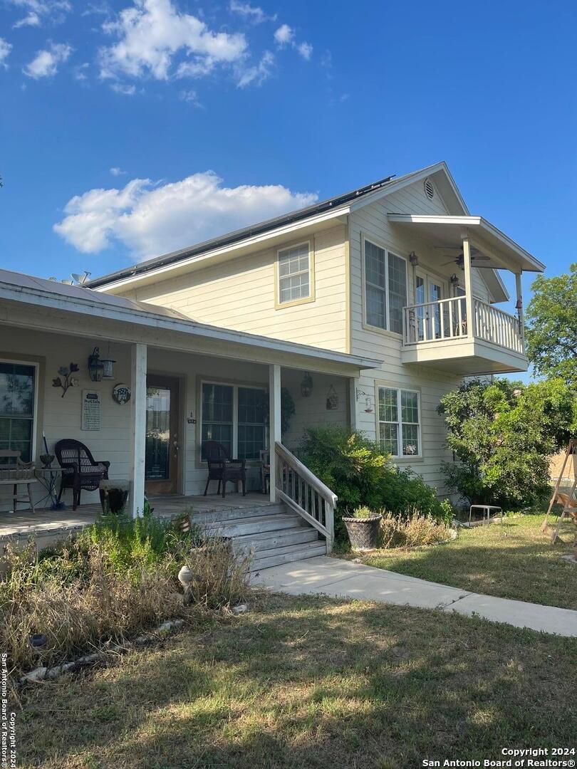 a front view of a house with porch