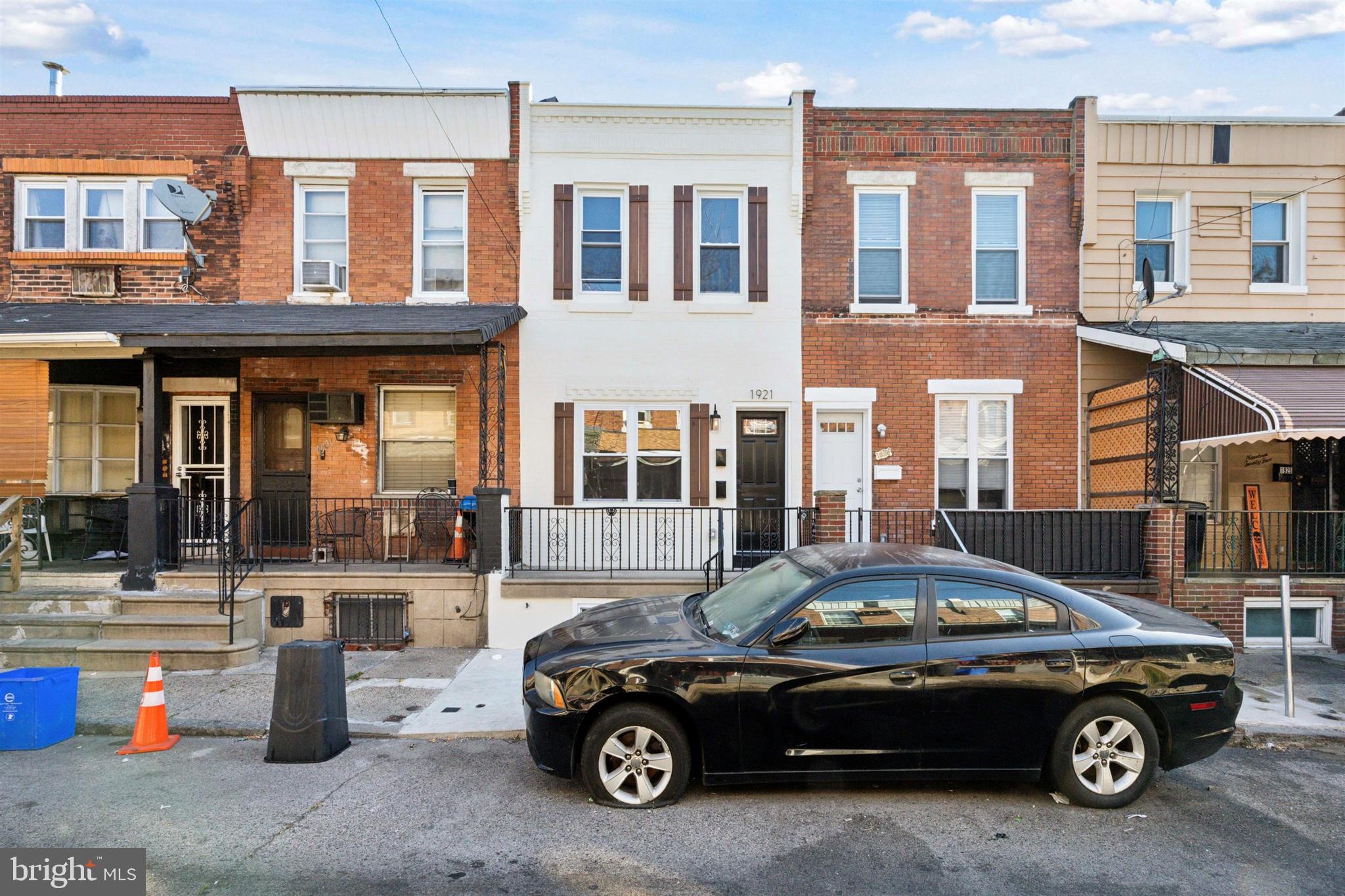 a car parked in front of a building