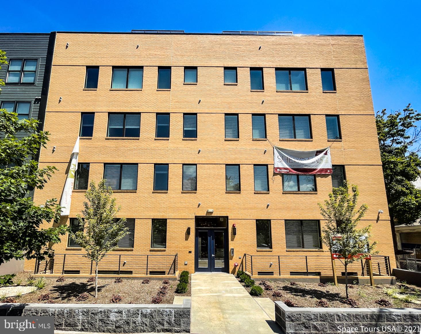 a front view of a building with street