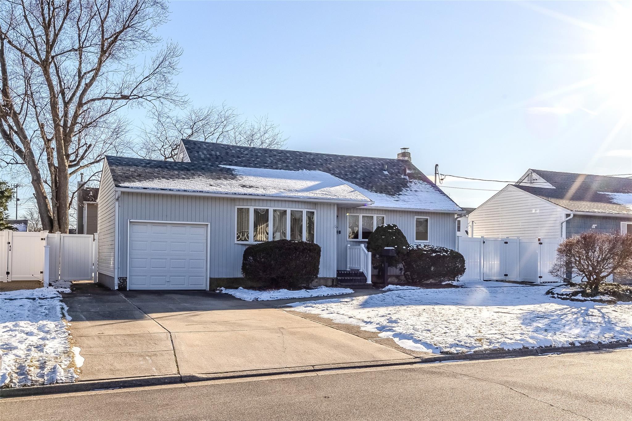 View of front of house with a garage