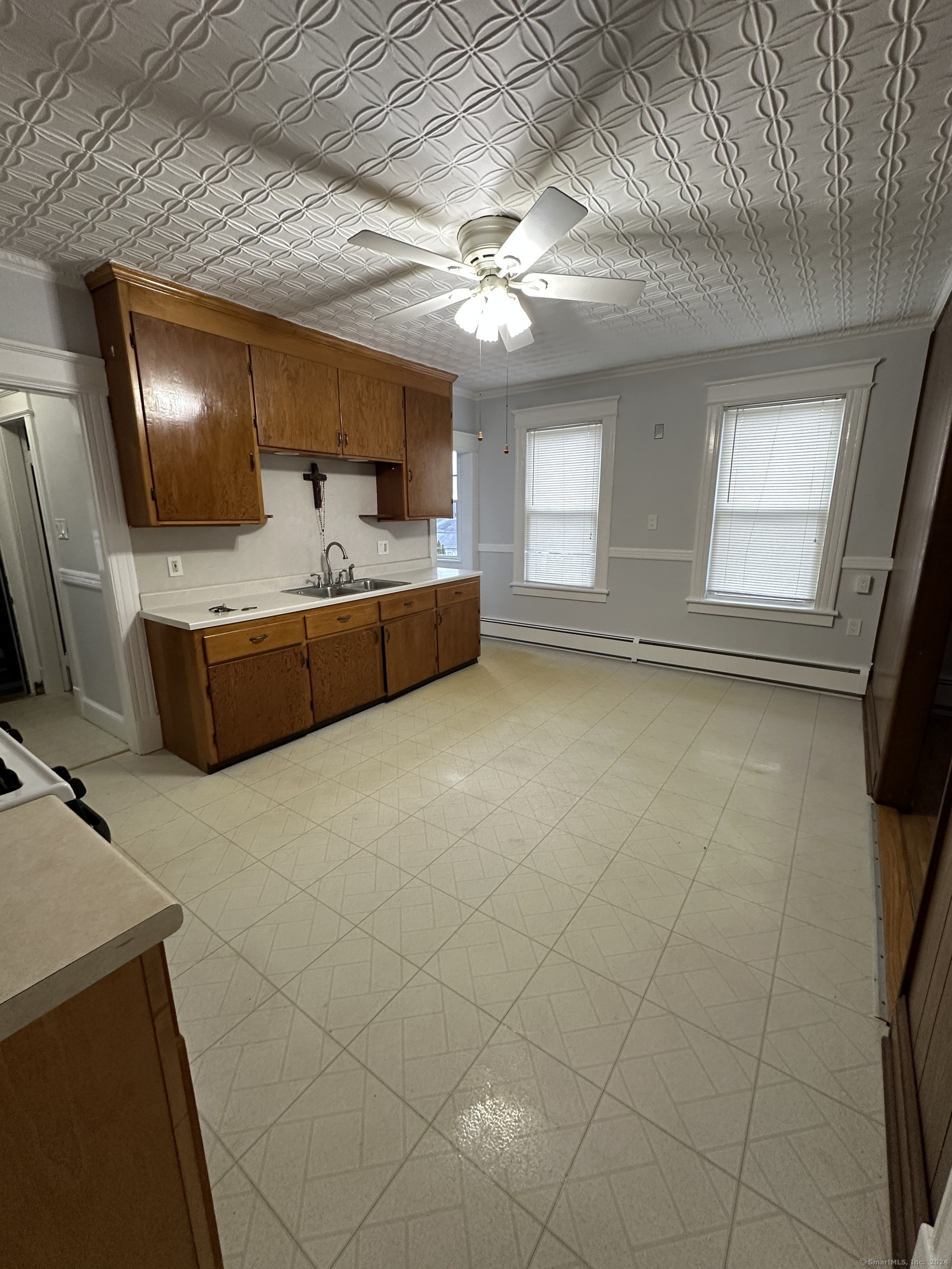 a room with furniture and a flat screen tv