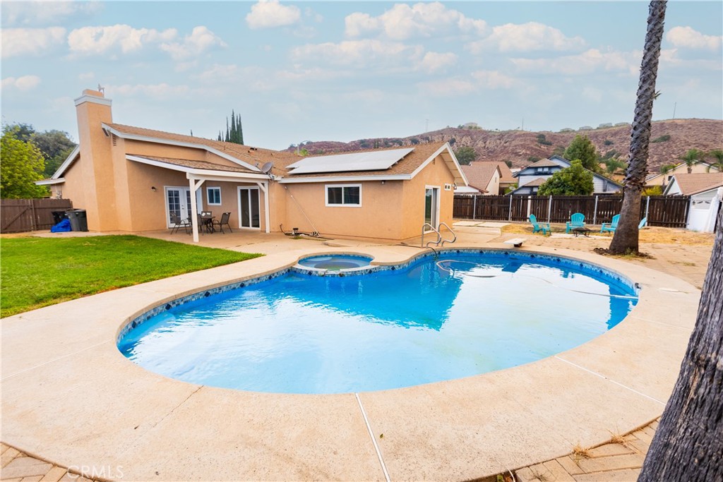 a view of a house with swimming pool