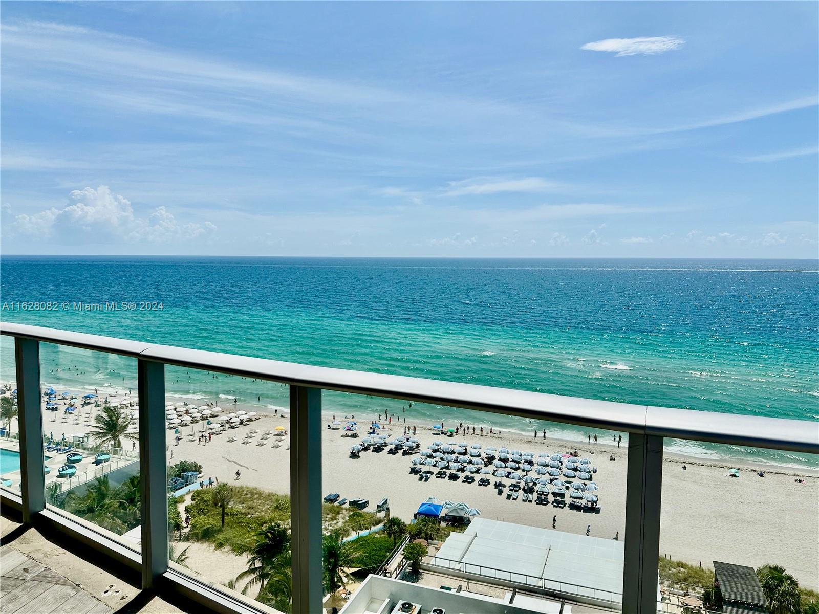 a view of a back yard from a balcony