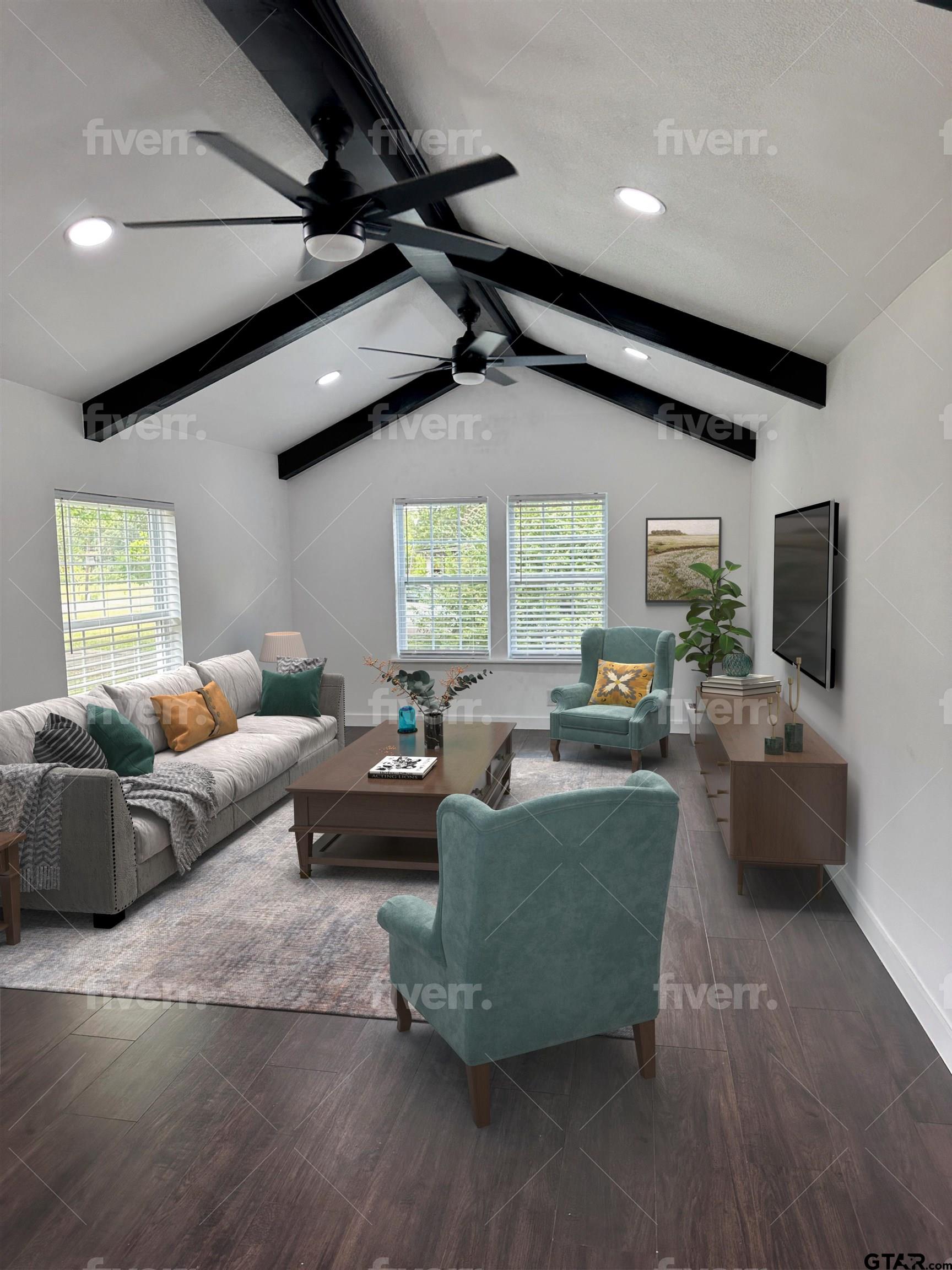 a living room with furniture and a flat screen tv