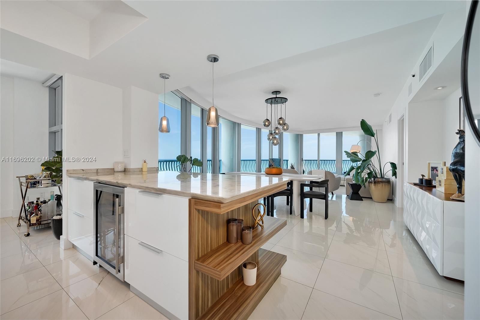 a view of living room and kitchen