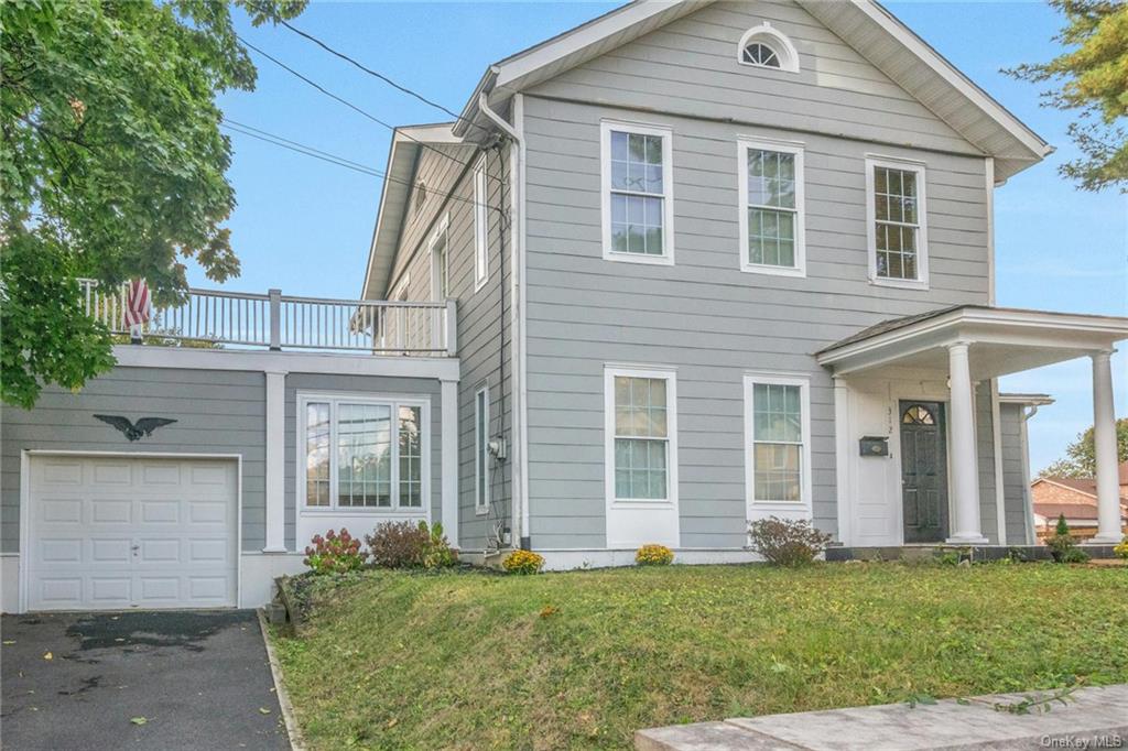 front view of a house and a yard