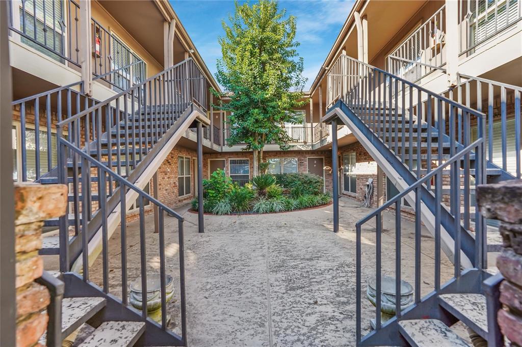 a view of entryway with wooden stairs