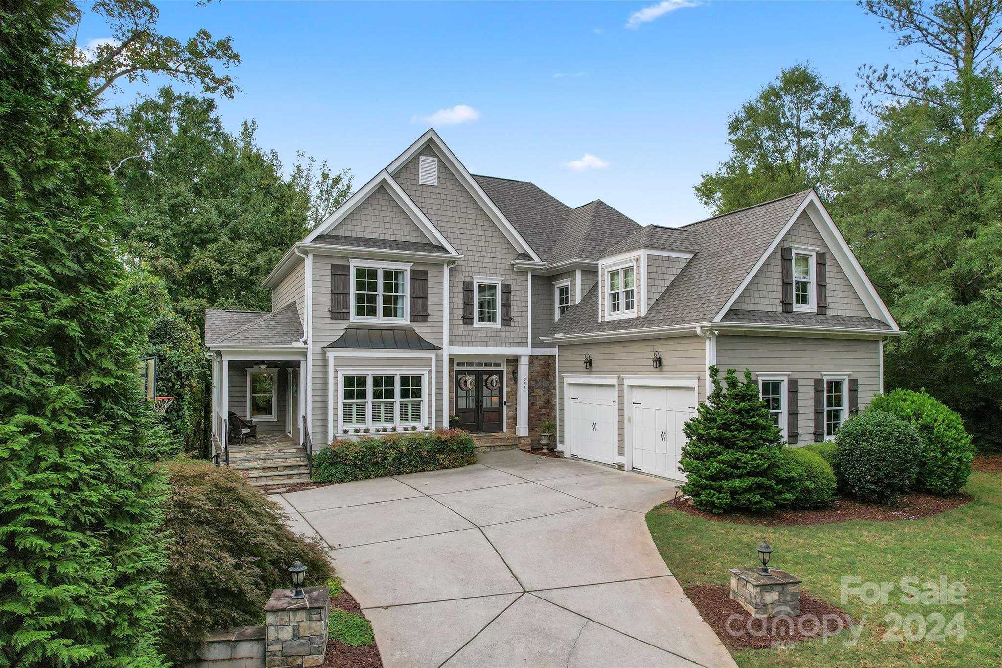 front view of a house with a yard