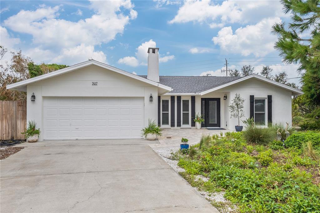 front view of house with a yard