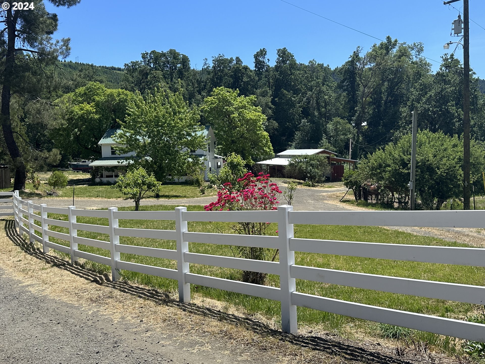 a view of a wooden fence