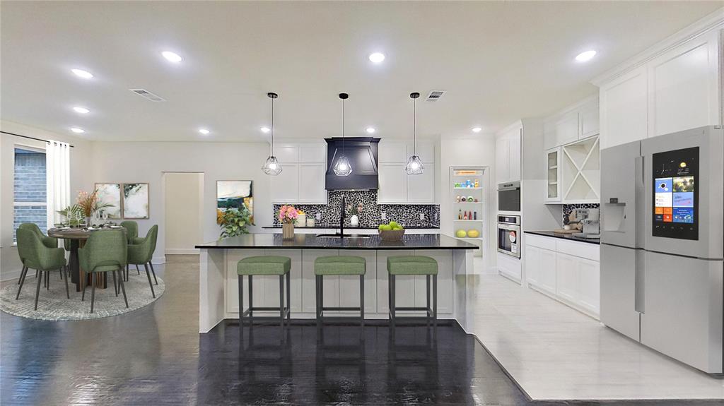 a kitchen with counter space cabinets and appliances