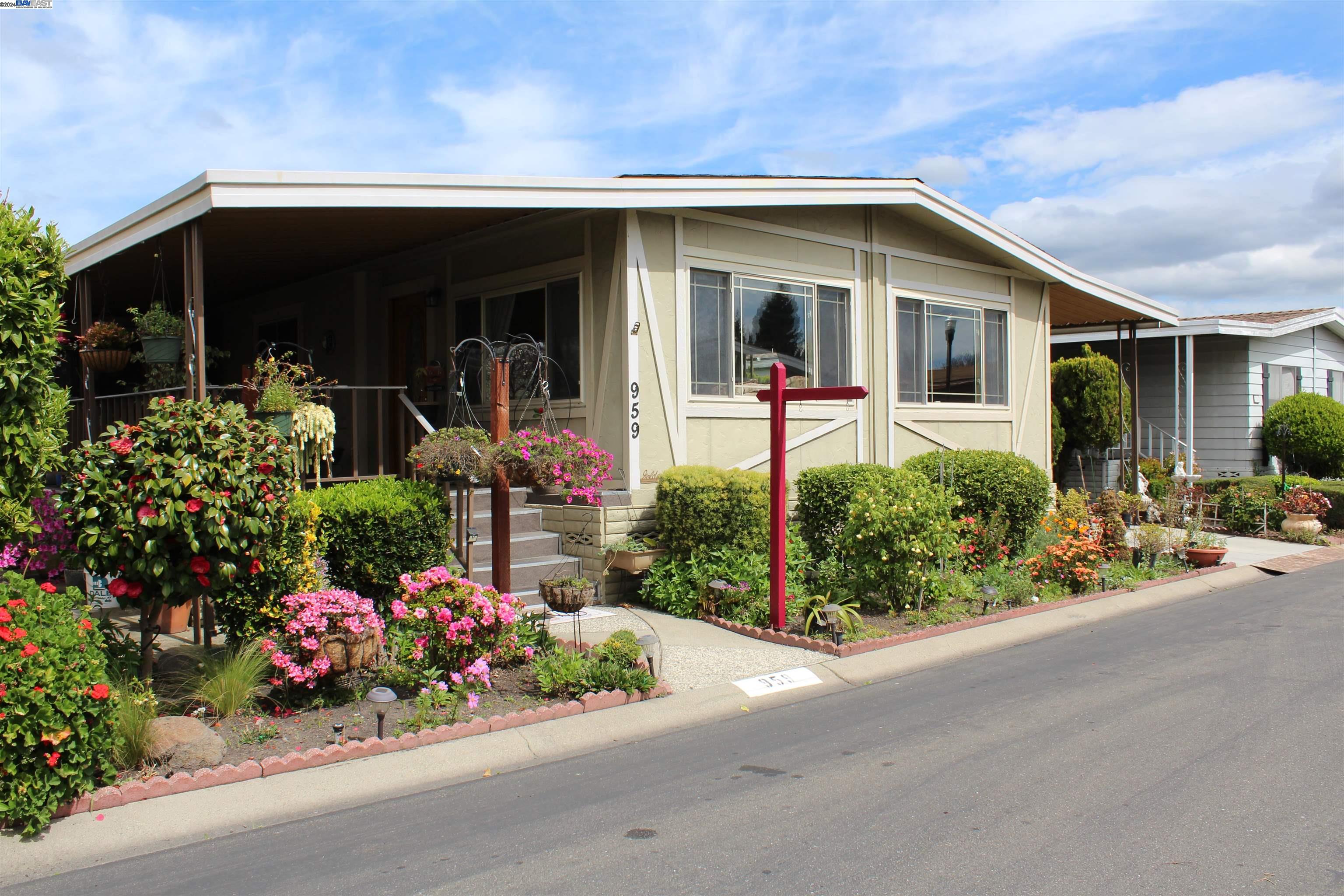 a front view of a house having a yard