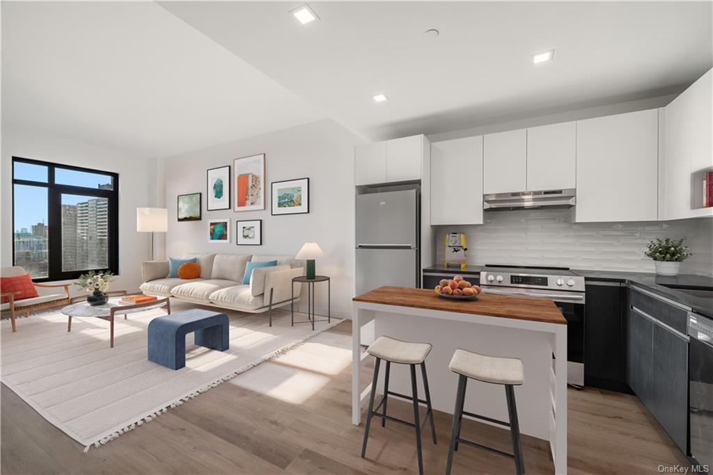 a kitchen with a table and chairs in it