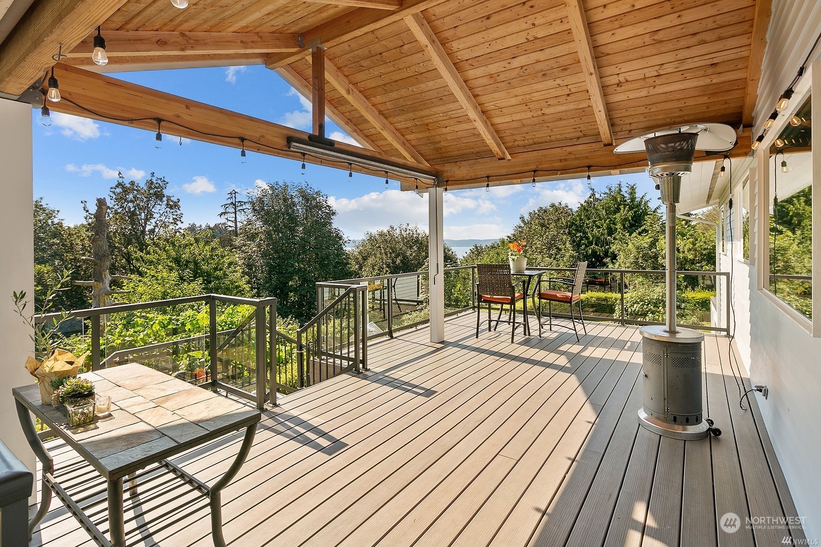 a view of a balcony with wooden floor