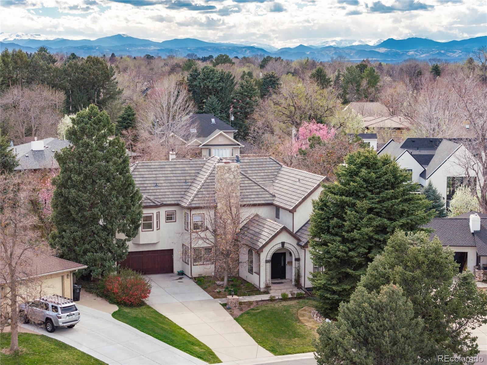 an aerial view of a house with a garden