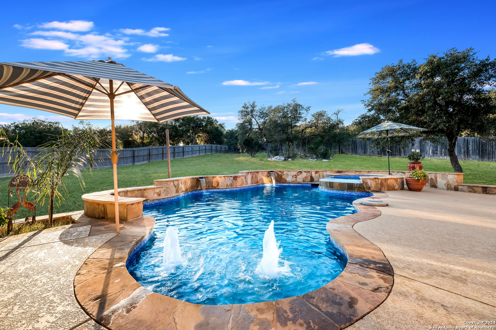 a view of a swimming pool with a sitting space