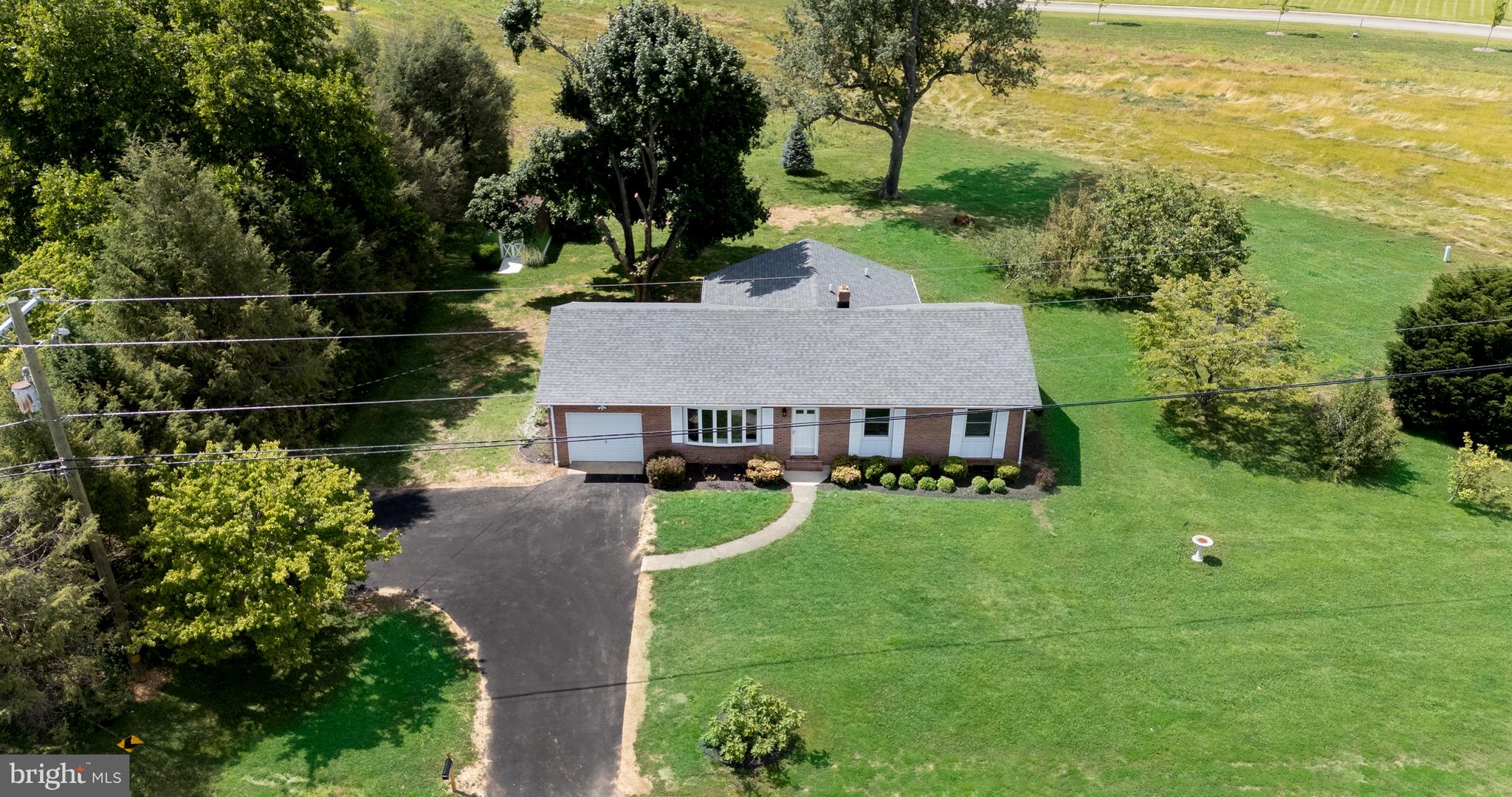 a view of a house with a garden