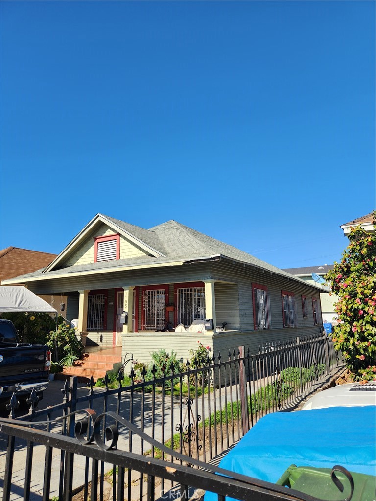 a front view of house with yard and seating area