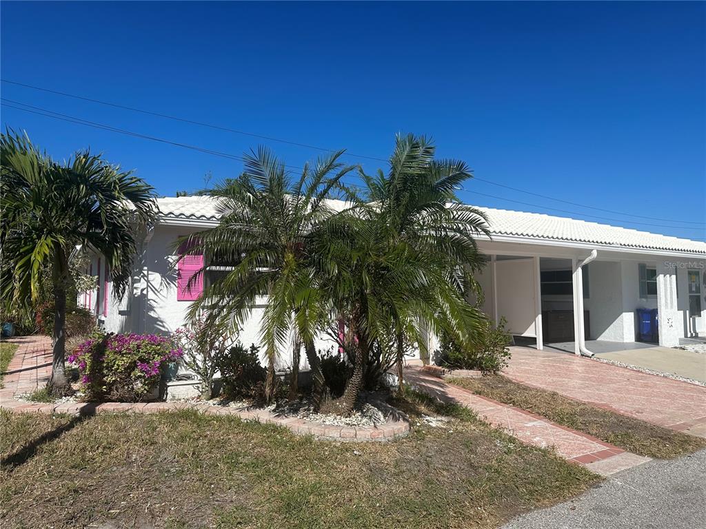 front view of a house with a street