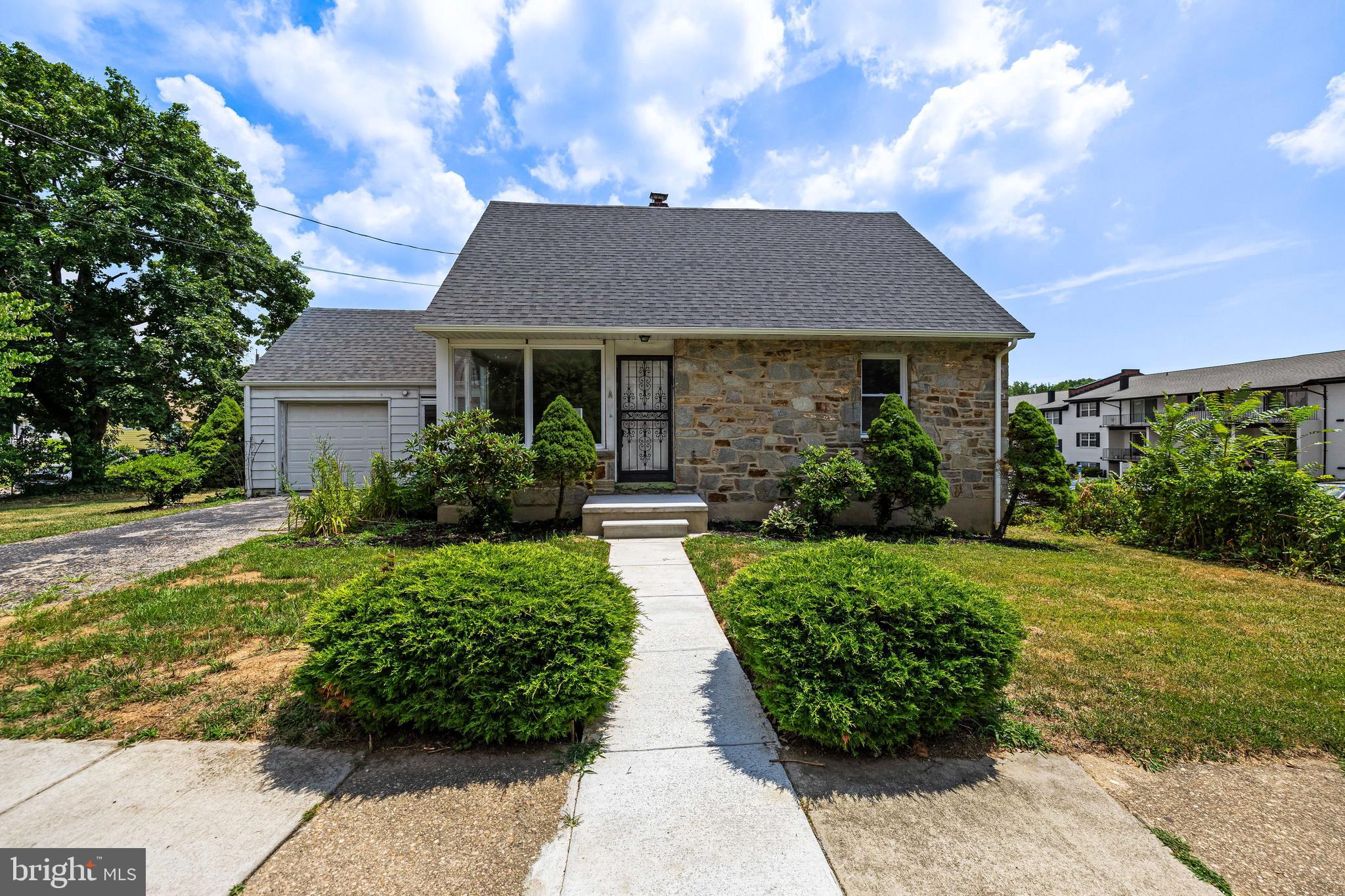 Front with attached garage