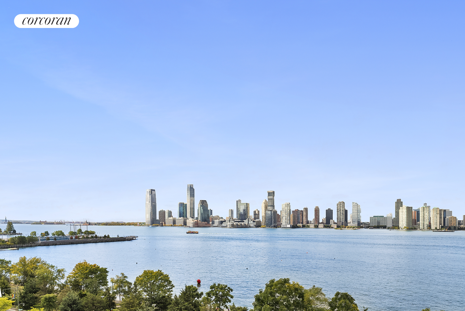 a view of a city with tall buildings in the background