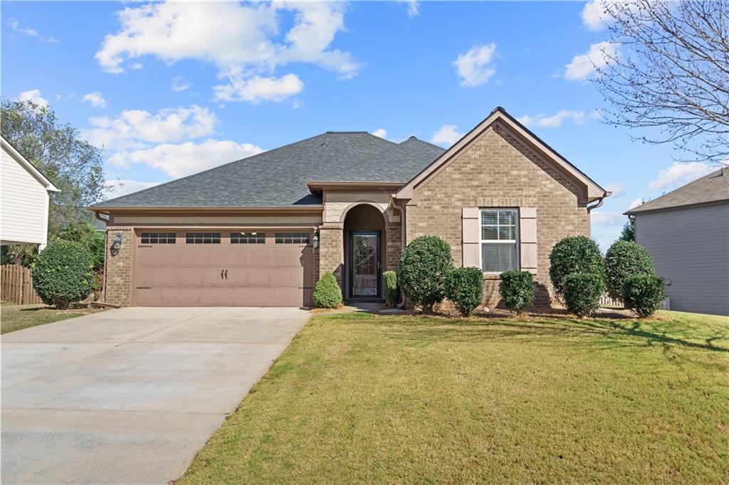 front view of a house with a yard